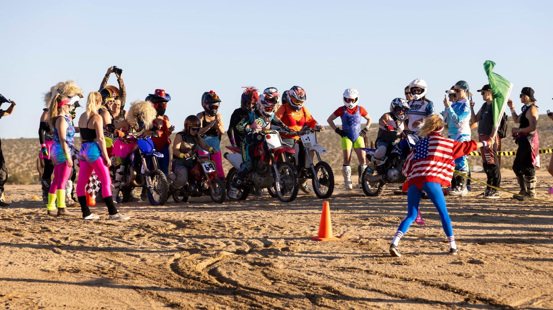 Women dirt bike riders together